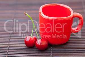 cherry cup on bamboo mat