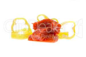 chunks of raw meat and pepper isolated on white