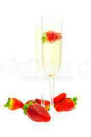 wine glass of champagne and strawberries isolated on white
