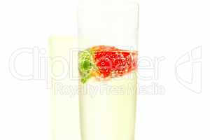wine glass of champagne and strawberries isolated on white