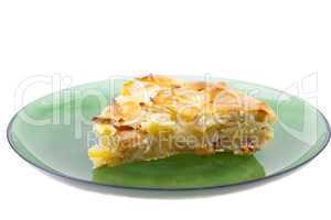 piece of apple pie on a plate isolated on white
