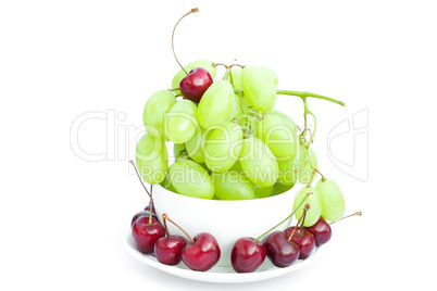 grapes cherry in the cup is isolated on white