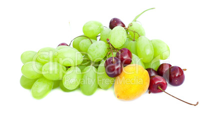 grapes, apricots and cherries isolated on white