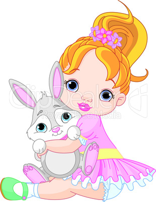 Little girl hugging toy bunny
