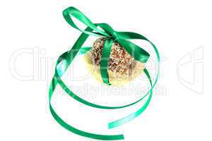 cake with coconut tied with ribbon isolated on white