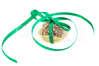 cake with coconut tied with ribbon isolated on white