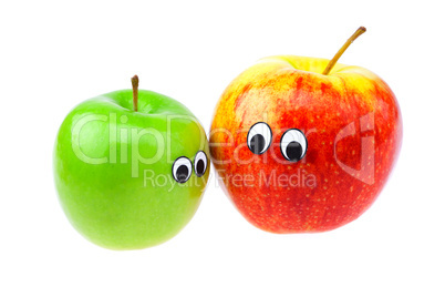 apples with eyes and faces isolated on white