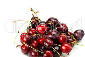 Cherries in a saucer isolated on white