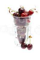 cherry in a glass isolated on white