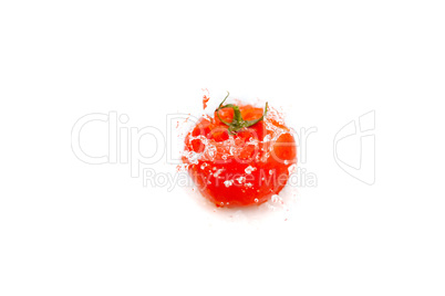 tomatoes with splashes of water isolated on white