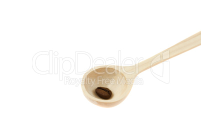 wooden spoon with coffee beans isolated on white