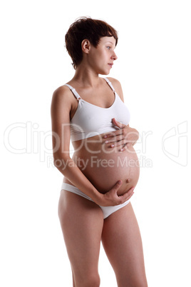 Pregnant young woman in lingerie