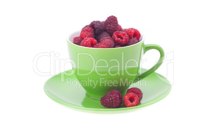 raspberry, saucer and cup is isolated on a white