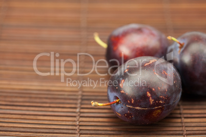 Plum on a bamboo mat