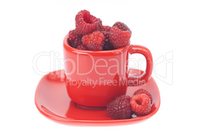 raspberry, saucer and cup is isolated on a white