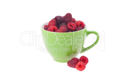 raspberry, saucer and cup is isolated on a white