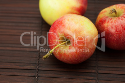 Apples on a bamboo mat