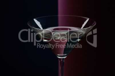 martini glass on a colored background