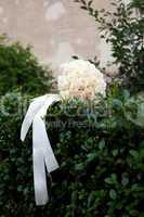 bridal bouquet on a green bush