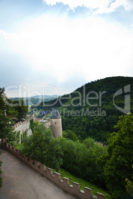 towers of the fortress against the sky and hills