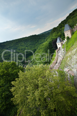 towers of the fortress against the sky and hills