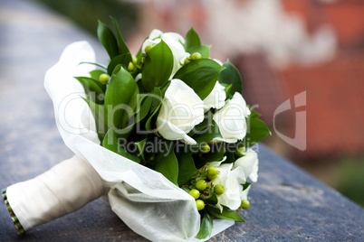 bridal bouquet lying on the concrete