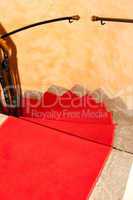 staircase with red carpet