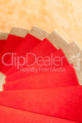 staircase with red carpet