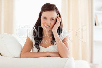 Young woman relaxing on a sofa