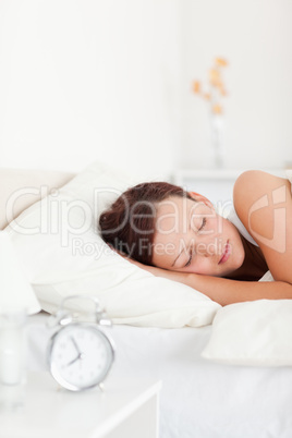 Close up of a Red-haired woman lying in bed