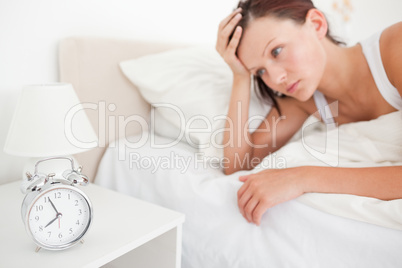 Red-haired woman waking up