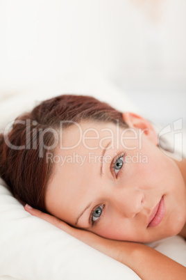 Photograph of a cute red-haired woman