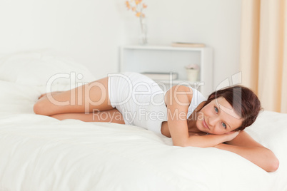 Relaxed woman on her bed