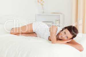 Relaxed woman on her bed