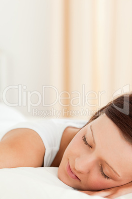 Close up of a cute Woman sleeping in her bed