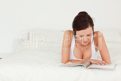 Portrait of a woman reading a magazine