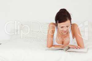 Portrait of a woman reading a magazine