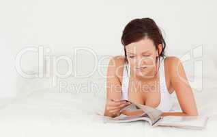 Cute woman reading a magazine