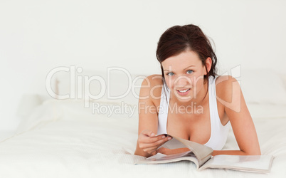Gorgeous woman reading a magazine