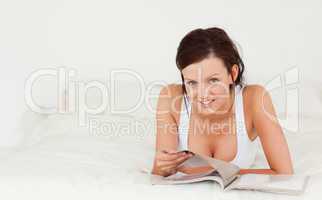 Gorgeous woman reading a magazine