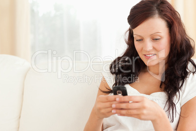 Young woman texting