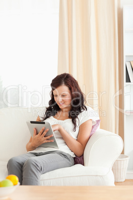 Young woman holding a tablet