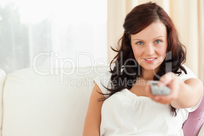 Close up of a woman watching TV
