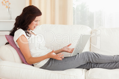 Annoyed woman with a laptop