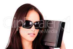 Pretty girl with modern MP3 stereo system on a white background