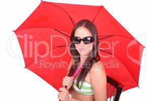 Portrait of young woman with a red umbrella on white background