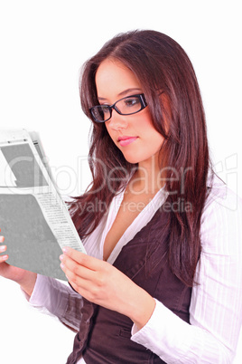 beautiful brunette reading the morning paper