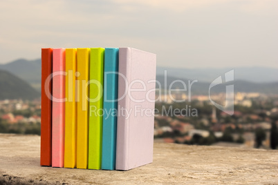 Row of the books laying outdoors