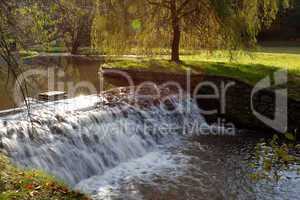 waterfall  in the autumn forest