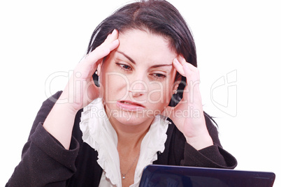 tired young woman in the office at the workplace suffers headaches. Isolated on white .
